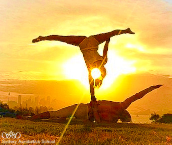 One Handed Twisted Handstand